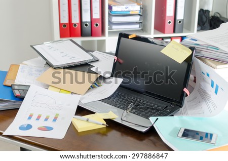 View of a untidy and cluttered desk