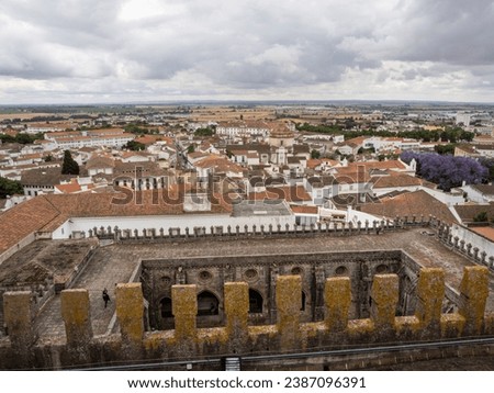 View from an upper terrace of Évora Cathedral, with the Gothic cloister in the foreground and the city and Alentejo landscape in the background. Portugal. Сток-фото © 