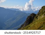 A view of a valley with mountains in the background, featured on flickr, new objectivity, creative commons attribution, panorama