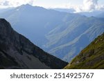 A view of a valley with mountains in the background, featured on flickr, new objectivity, creative commons attribution, panorama