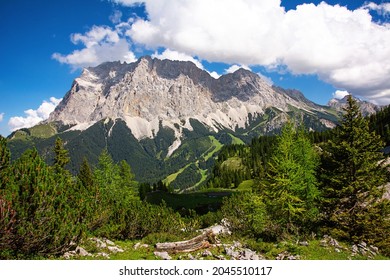 View from a vantage point of the valley with the ski slopes and the Zugspitze in summer in Ehrwald in Austria.