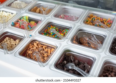 A View Of A Variety Of Toppings, Seen At A Local Frozen Yogurt Restaurant.