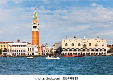 View Of Venice From The Lagoon. Quay And The Piazzetta San Marco, The Doge's Palace, Bell Tower Companile, Sansovino Library, Clock Tower And Bridge Of Sighs 