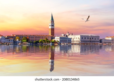 View of the Venice lagoon, St Mark's Bell Tower and Doge's palace at sunset, Italy