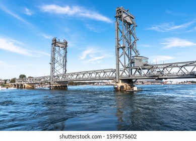 View Of Vertical Lift Bridge Spanning A Mighty River On A Clear Autumn Day