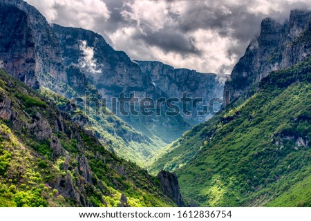View of Vikos Gorge, a gorge in the Pindus Mountains of northern Greece, lying on the southern slopes of Mount Tymfi, one of the deepest gorges in the world. Zagori region, Greece.