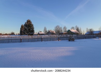 View of the village and wooden houses from the backyard on a winter sunny day. Frosty weather. Beautiful rural landscape  - Powered by Shutterstock