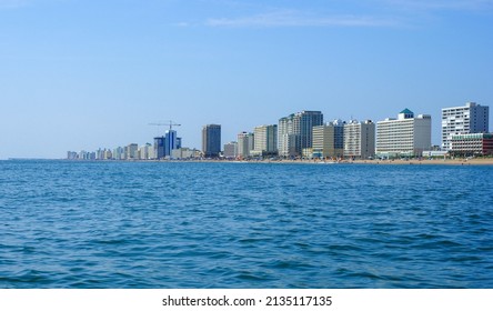 A View Of The Virginia Beach Oceanfront With Hotels And The Fishing Pier Seen From The Water