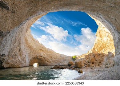 View of the volcanic open cave of Sykia, Milos island, Cyclades, Greece - Shutterstock ID 2250558343