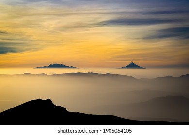 View Of The Iztaccíhuatl Volcano And Popocatépetl Volcano From The Nevado De Toluca. Beautiful Sunrise Of The Volcanoes.