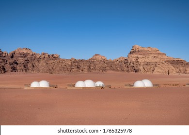 View Of Wadi Rum Desert (Valley Of The Moon) With Desert Camps And Luxury Bubble Tents, Jordan. Arabian Desert