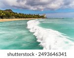 View of Waikiki Beach with people relaxing.