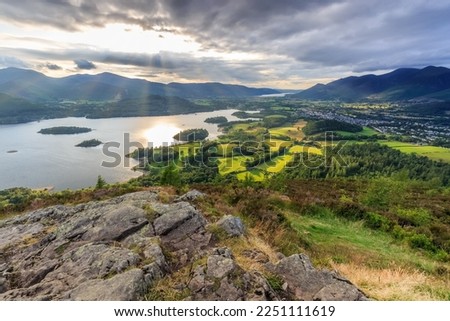 View from Walla Crag as the Sun rays shine down on Derwentwater in Cumbria