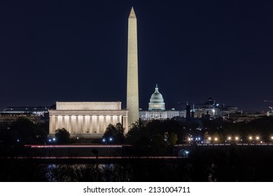 View Of Washington, DC Monuments From Arlington National Cemetery At Night