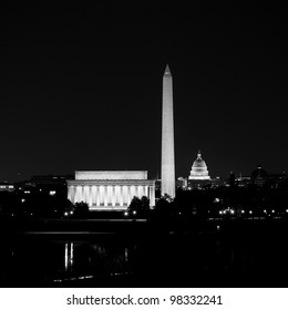 View Of Washington DC Skyline At Night With Lit Up Lincoln Memorial, Washington Monument And The Capitol