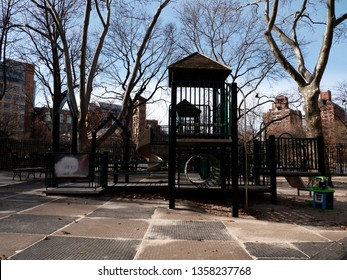 View Of Washington Square Park In New York City. Children's Playground At Winter Time.