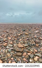 A View Of The Water Horizon In Canada With Rocky Ground