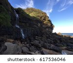View of the waterfall at the Stanwell Park Beach in Australia.