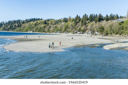 A View Of Waterfront Homes And A Tide Pool In Des Moines, Washington.