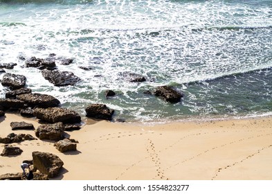 View of waves hitting the rocks. Ocean, background.