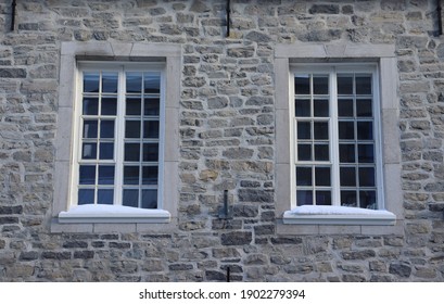 View Of White Wooden Tile Windows And An Old Stone House Of Dark Grey And Pale Fields