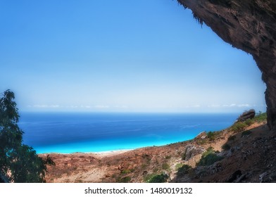 View from the wild cave in the mountain of the emerald sea in the Indian Ocean. Socotra island.
