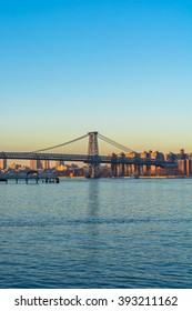 View of the Williamsburg Bridge from northern Brooklyn on the shore os the east river