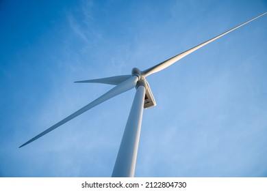 View Of Wind Farm Or Wind Park, With Wind Turbines For Generating Electricity. Green Energy Transition.