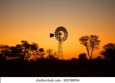 View to Windmill in Africa at sunset