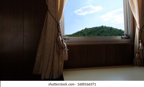 View of the window of a moving passenger trainwith landscape outside the window. Screens and comfortable travel,Interior of a passenger train.