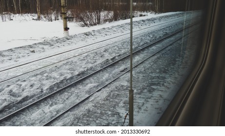 View from the window of the passenger train. winter weather