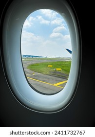 View from the window of a plane that has not yet taken off