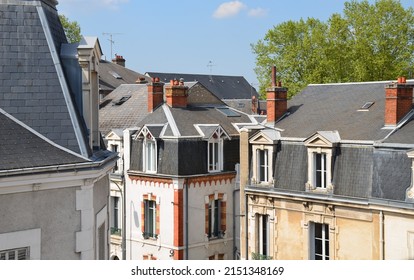 View from the window, roofs and floors of old houses in the city, view from above.
