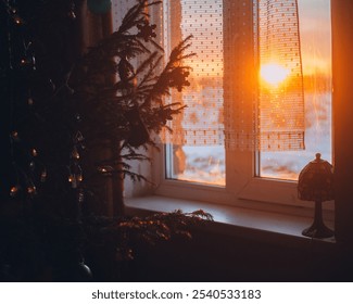 The view from the window of the sun and snow.