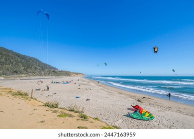 View of windsurfers on beach on Highway 1 near Davenport, California, United States of America, North America