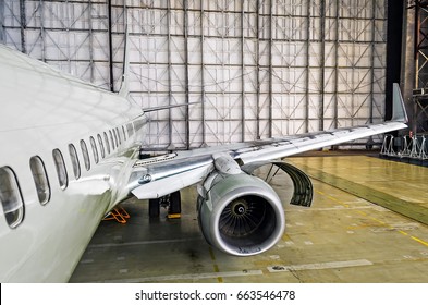 View Of The Wing And Engine Of The Aircraft Repair In The Hangar