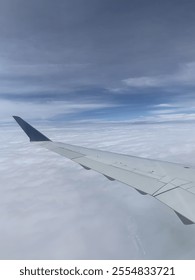 view of wing on airplane while in flight