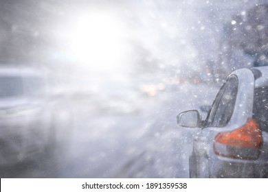 View Of The Winter Road From The Car, Traffic In The Seasonal City, Bad Weather In The Northern City