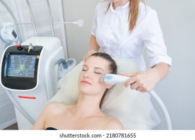 View women's spa procedure. Electrical stimulation facial skin care. Microcurrent lifting face. Beauty spa procedure. Rejuvenation non-surgical treatment in the inner room - Shutterstock ID 2180781655