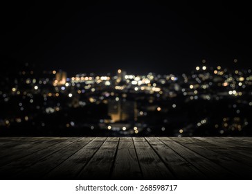 View from wooden plank above phuket town at night