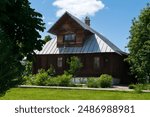 View of the wooden residential building on the territory of the Holy Intercession Convent on a sunny summer day, Suzdal, Vladimir region, Russia