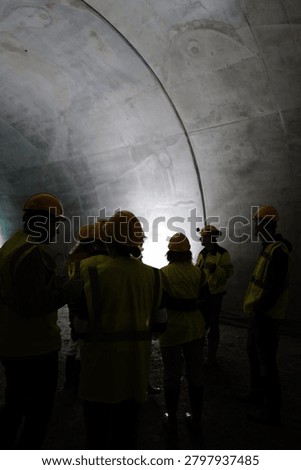 View of workers at the construction site of a subway tunnel under the city