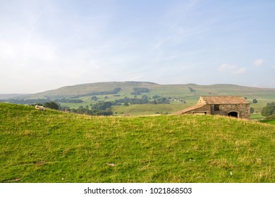 A view of the Yorkshire Dales, in northern England, a green and pleasant land indeed. - Shutterstock ID 1021868503