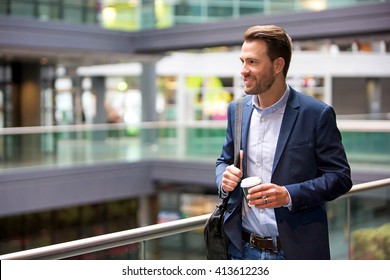 VIew Of A Young Attractive Business Man Drinking Coffee