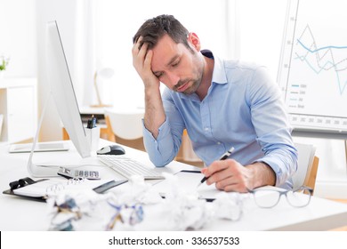 View Of A Young Attractive Man Too Tired To Work