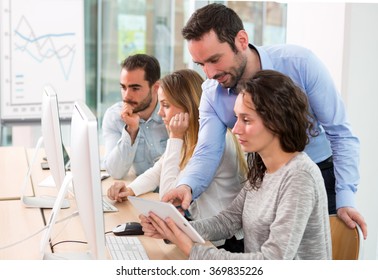 View of a Young attractive people taking a training course with formator - Shutterstock ID 369835226