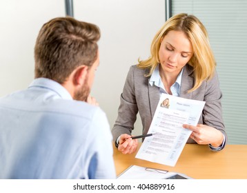 View Of A Young Attractive Woman During Job Interview