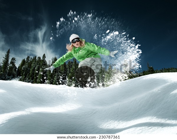 view\
of a young girl snowboarding in winter\
environment