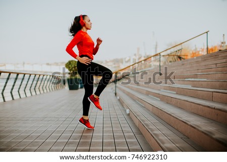 View at young woman exercising outside
