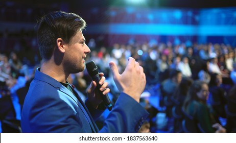 Viewer crowded audience speak with speaker in microphone. Participant forum speaking. Educational speech business man. Speaker group auditorium people. Presenter talk. Education conference spectator. - Shutterstock ID 1837563640